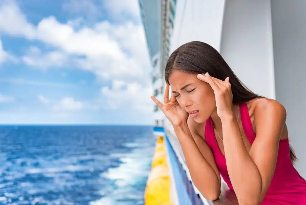 Ship Illness Woman With A Headache Standing By Ship Railing