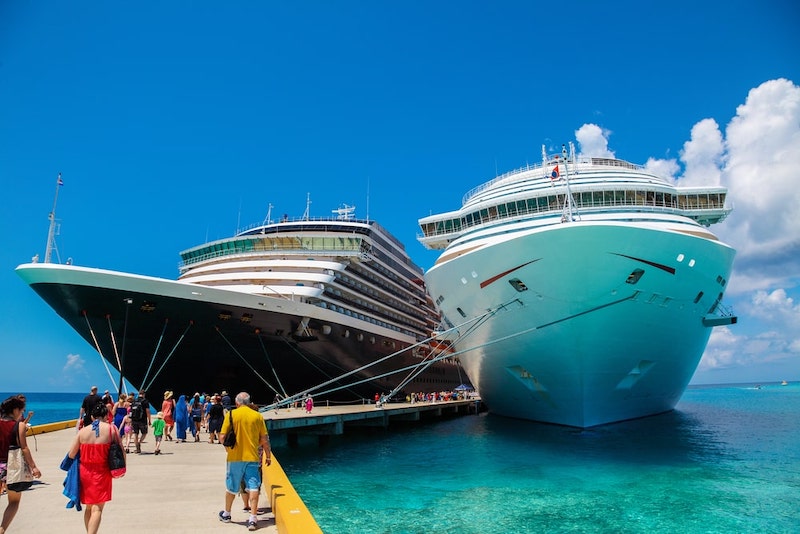 Two Cruise Ships Docked Next To Each Other