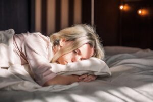 Woman laying in bed