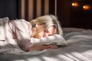 Woman laying in bed